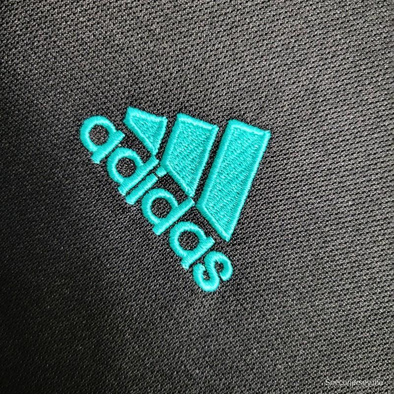 قميص ريترو بأكمام طويلة 17-18 ريال مدريد ذهاباً وإياباً أسود اللون
