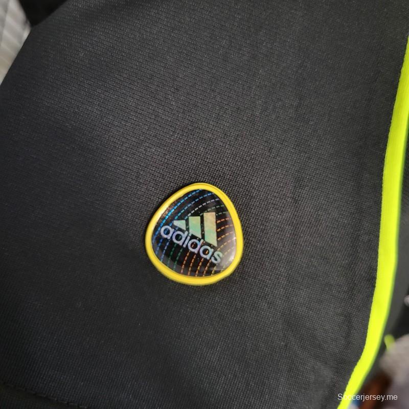 قميص كرة قدم ريترو 10-11 ريال مدريد خارج الديار أسود اللون
