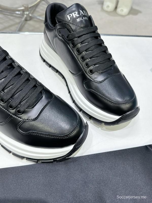 2025 Unisex Prada Black Leather Sneakers KFY00310