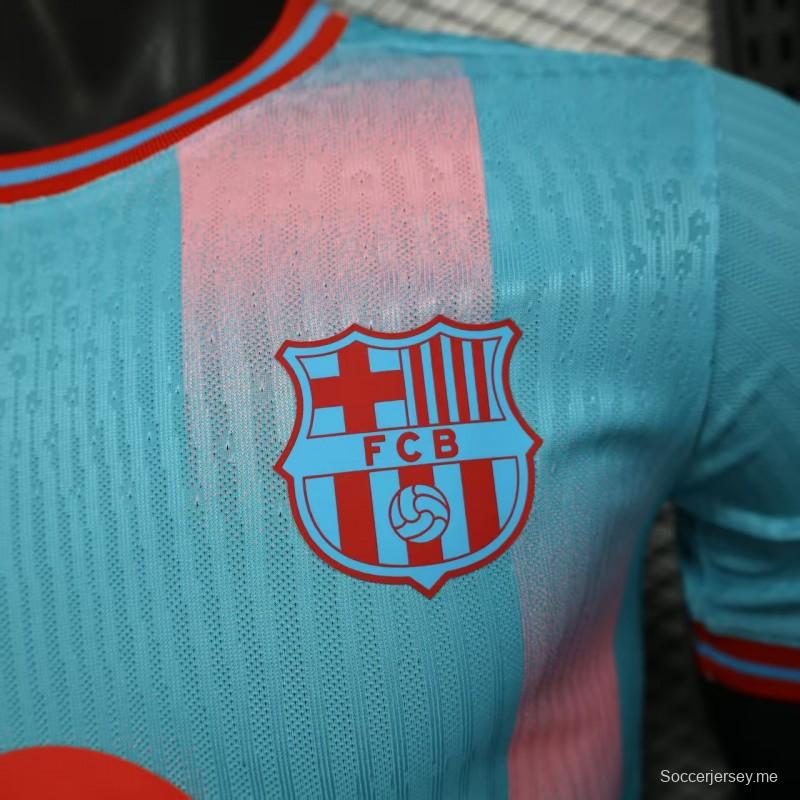 إصدار اللاعب 25/26 قميص برشلونة أزرق سماوي مع قميص مخطط متدرج وردي اللون