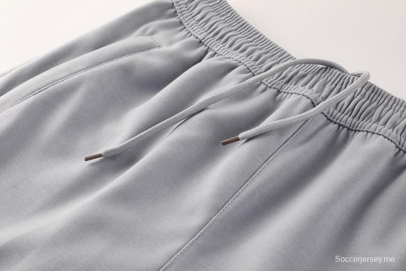 25/26 مانشستر يونايتد هويد جاكيت بسحاب كامل رمادي اللون هويد 25/26 مانشستر يونايتد + بنطلون طويل