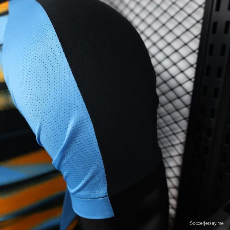 إصدار اللاعب 25/26 قميص أولمبيك مارسيليا أزرق مع قميص مخطط متدرج برتقالي