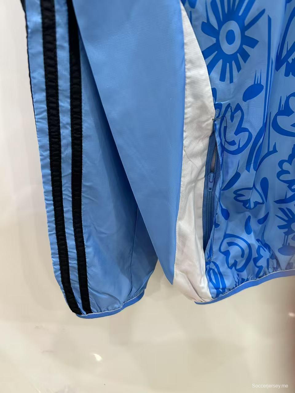 2025 إيطاليا 2025 أزرق فاتح/بيج فاتح مع سترة واقية من الرياح قابلة للانعكاس بنقشة زهور