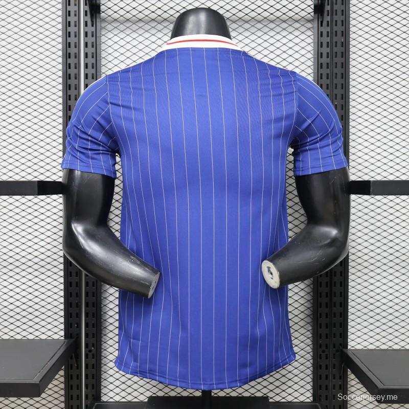 قميص اللاعب الإصدار 2026 باللون الأزرق الياباني مع أيقونات "تراس" باللون الأبيض