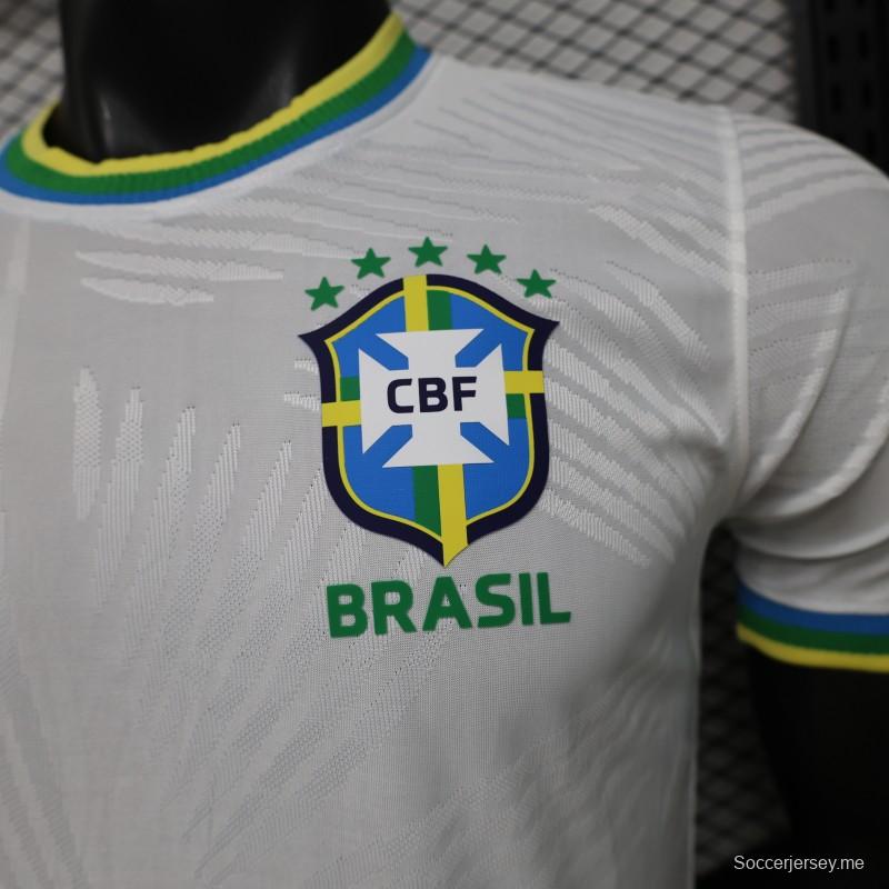 قميص اللاعب الإصدار 2026 باللون الأبيض بنمط أوراق النخيل، إصدار خاص