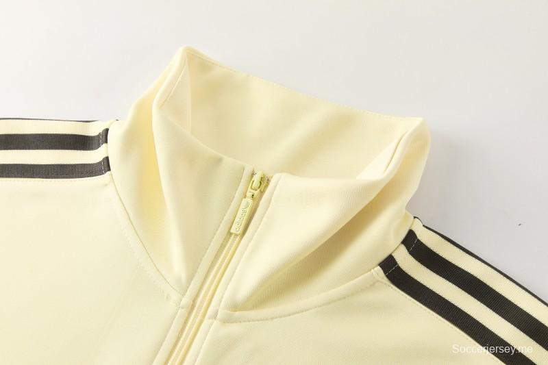 2026  سترة بأزرار كاملة + بنطال طويل من Adidas بلون المشمش