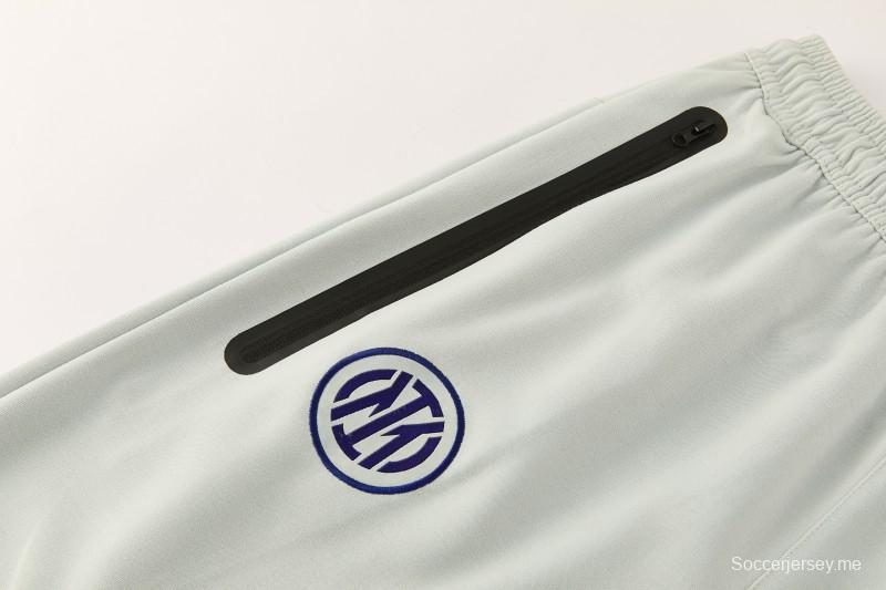 26/27 بدلة رياضية من إنتر ميلان بلون أخضر فاتح مع سحاب كامل وغطاء للرأس + بنطال طويل