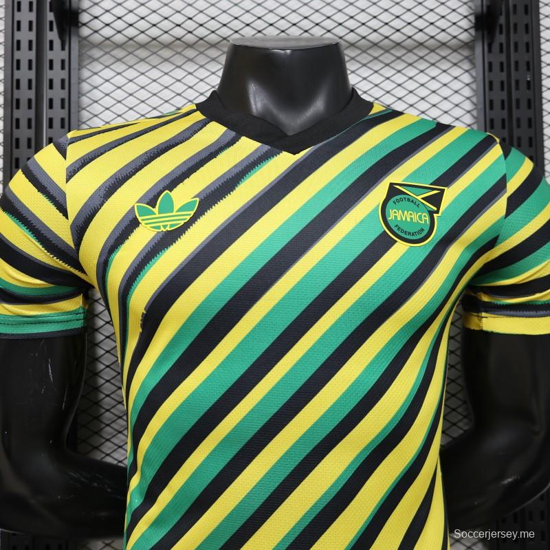 قميص اللاعب الإصدار 2026، جامايكا × أديداس أوريجينالز، قميص المباراة الرئيسية الأصفر بخطوط مائلة