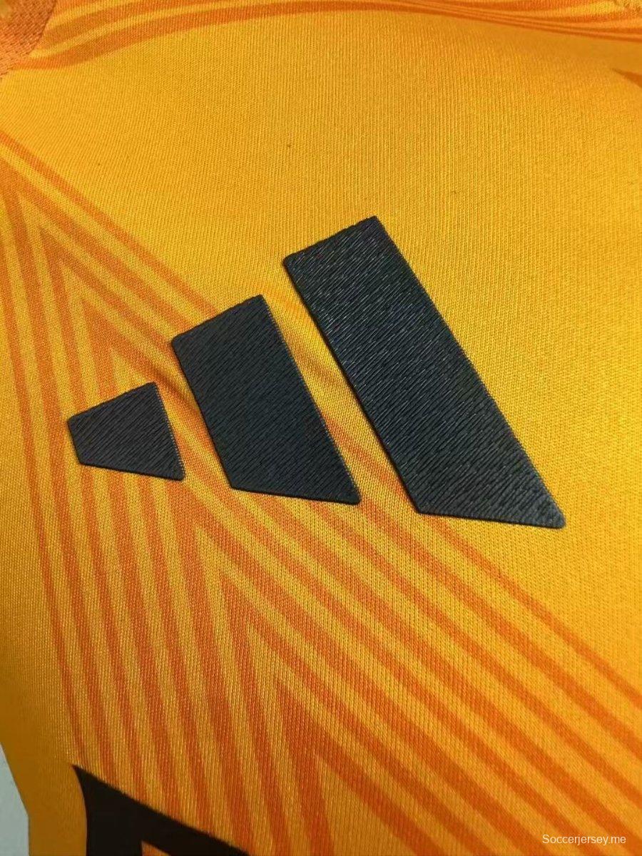 إصدار اللاعب 24/25 قميص ريال مدريد 24/25 ريال مدريد خارج أرضه برتقالي اللون
