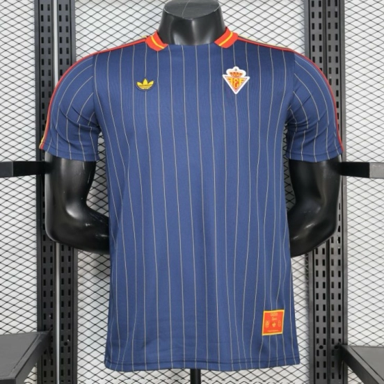 2026 نسخة اللاعبين إسبانيا أزرق داكن مع خطوط صفراء رفيعة قميص